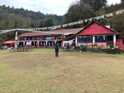 Grandfather and Nabbu Raaj, beautiful Mountain Discover Lodge, Macchapucchre shining down, the dining hall, my humble room, and puppies!
