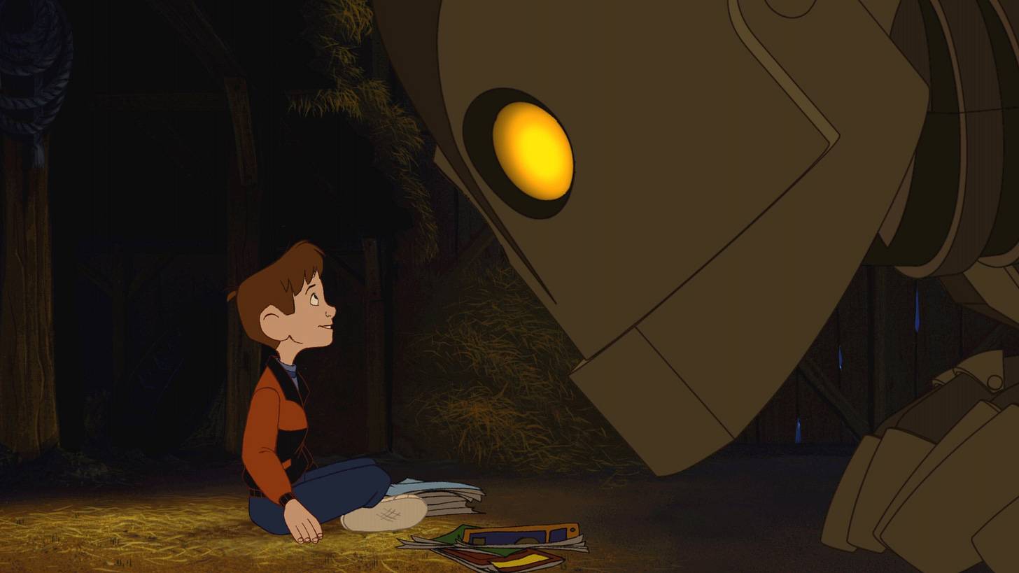The Iron Giant | Still features The Giant looking down at Hogarth Hughes.