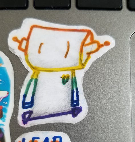 a cartoon robot drawn and painted on many surfaces.