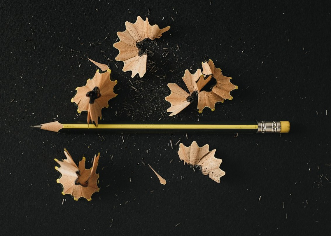 a yellow pencil with leaves