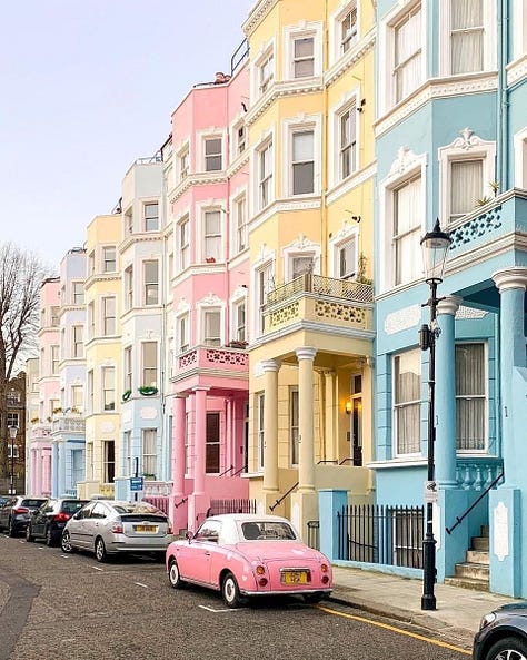 The blue and white buildings of Santorini, the colourful townhouses of Notting Hill in London, and the red and orange adobe houses in the American Southwest, reflecting the cultural and historical context of the place through their choice of colours, creating visually striking landscapes that relate to the surrounding environment.