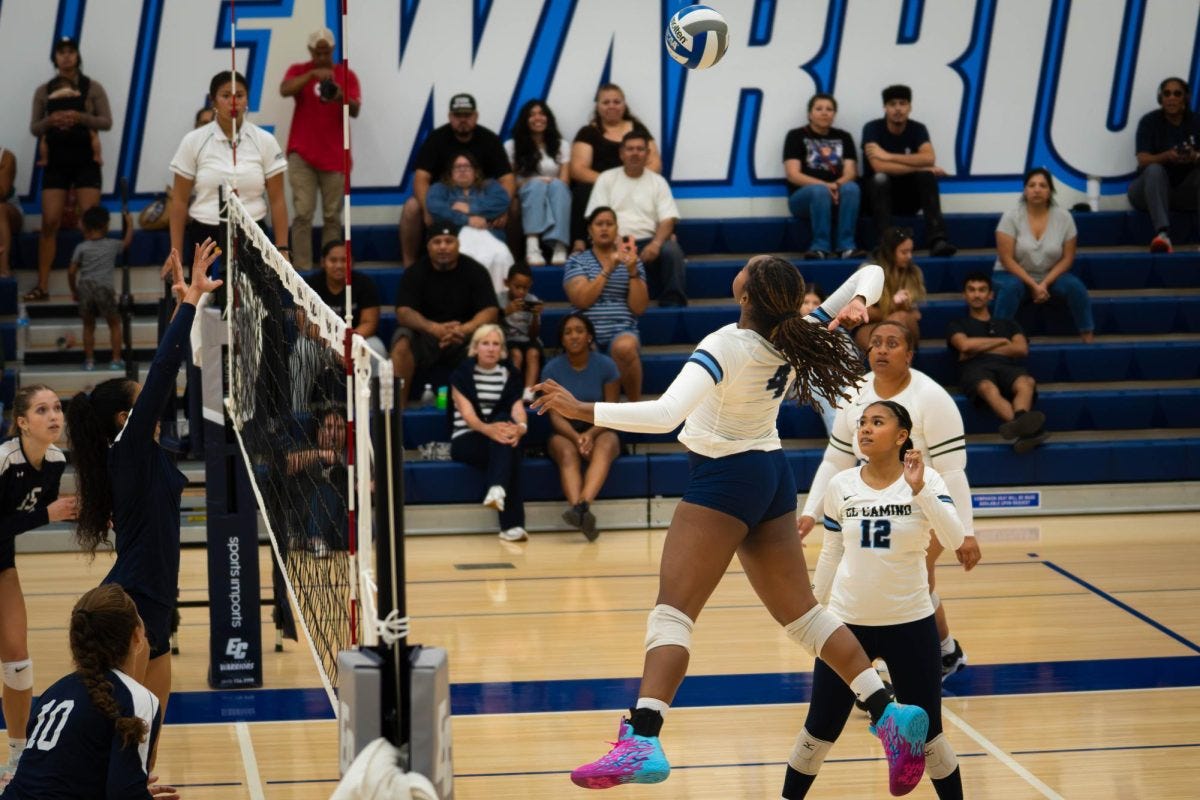 Warriors middle blocker Amiekal Looney jumps for an attack in their match against Orange Coast College at the ECC Gymnasium on Wednesday, Sept. 3. Looney led the Warriors with 5 K's in their 0-3 loss to OCC. (Ryan Hirabayashi | The Union)