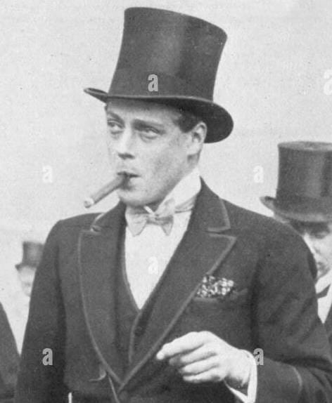 George V smoking in portraits and candidly