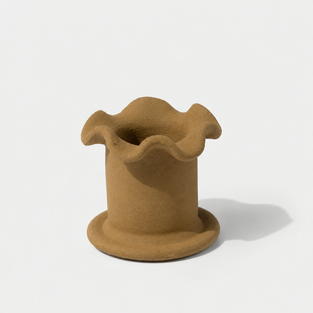 Hand-shaped clay toothbrush holder made at Makerspace