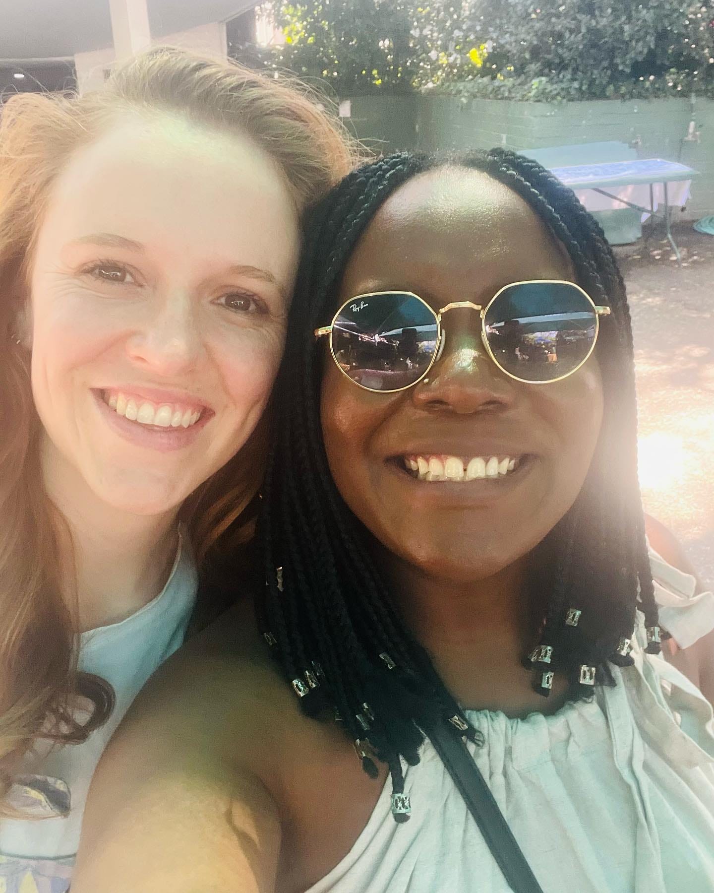May be an image of 2 people, people smiling and eyewear