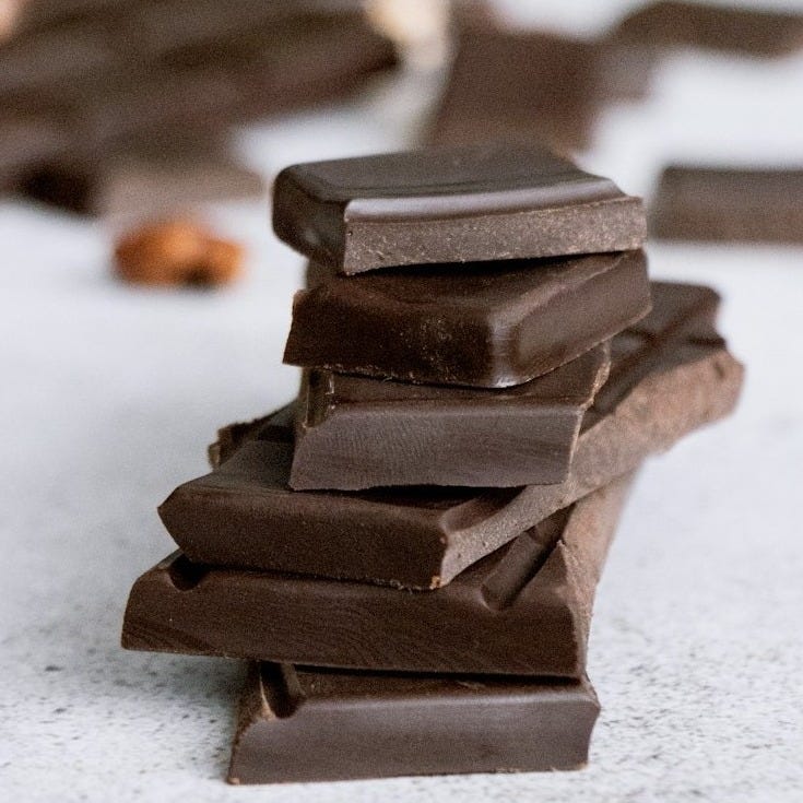 brown chocolate bars on white surface brown chocolate bars on white surface