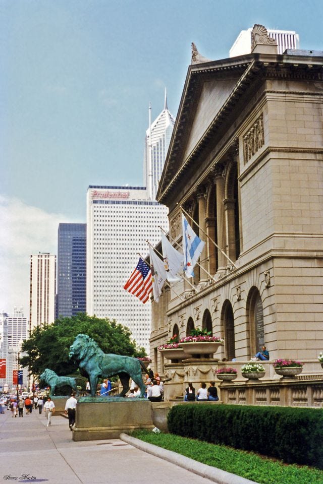 The iconic bronze lion statues guarding the main entrance of The Art Institute of Chicago on Michigan Avenue, July 1996. The iconic bronze lion statues guarding the main entrance of The Art Institute of Chicago on Michigan Avenue, July 1996.