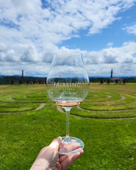 Beautiful natural wine, Oregon Vineyard, budding vines, wine with a view