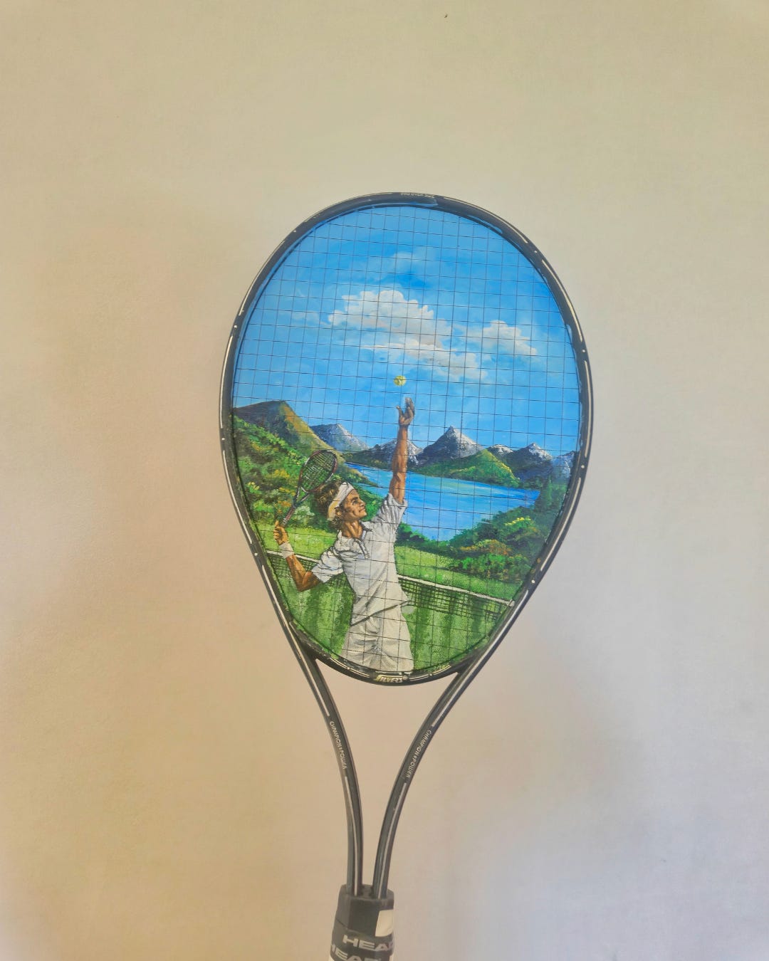 A hand painted tennis racket