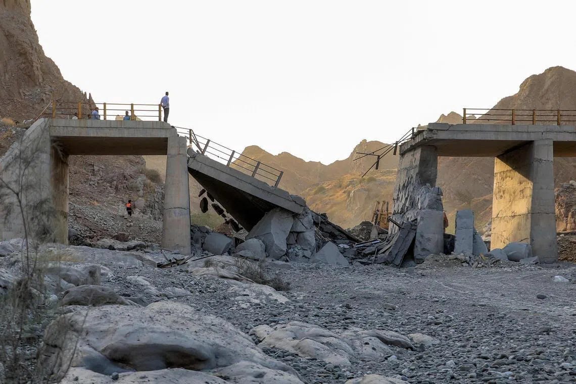 A heavily-damaged bridge which was hit by a US strike connecting Roudan and Bandar Abbas in southern Iran on July 18.