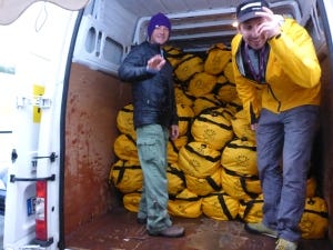 The team behind TDG preparing the runners' kit bags