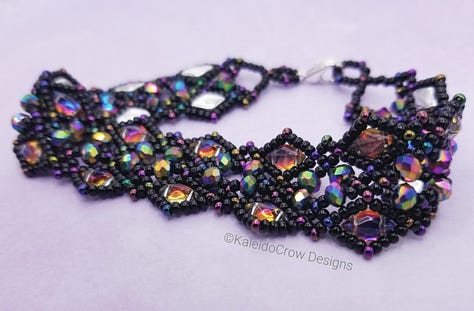 closeup photos of a beaded necklace made from black and rainbow/oil slick color shift beads