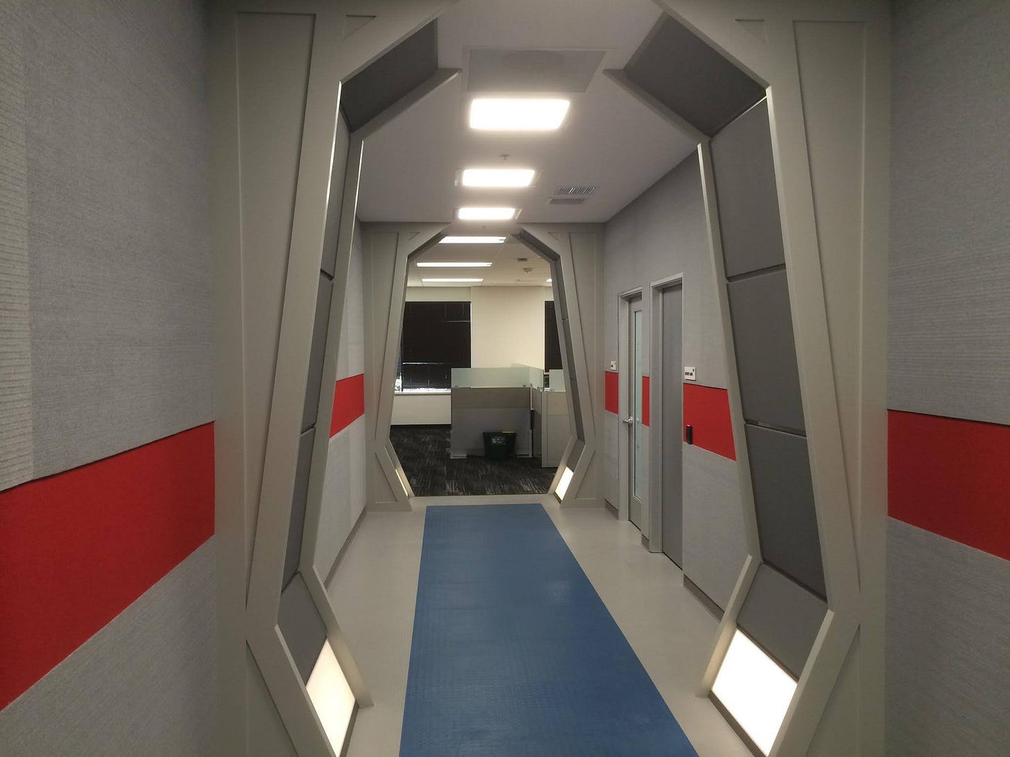 Another view into the same typical office building, except there's a Star Trek: The Next Generation style corridor.