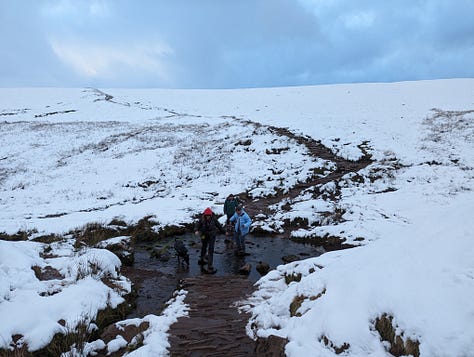 Sunset walk on Pen y Fan in winter with snow