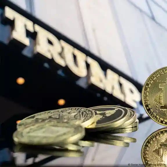 A photomontage of a collection of Bitcoins with the Trump Tower in New York behind A photomontage of a collection of Bitcoins with the Trump Tower in New York behind