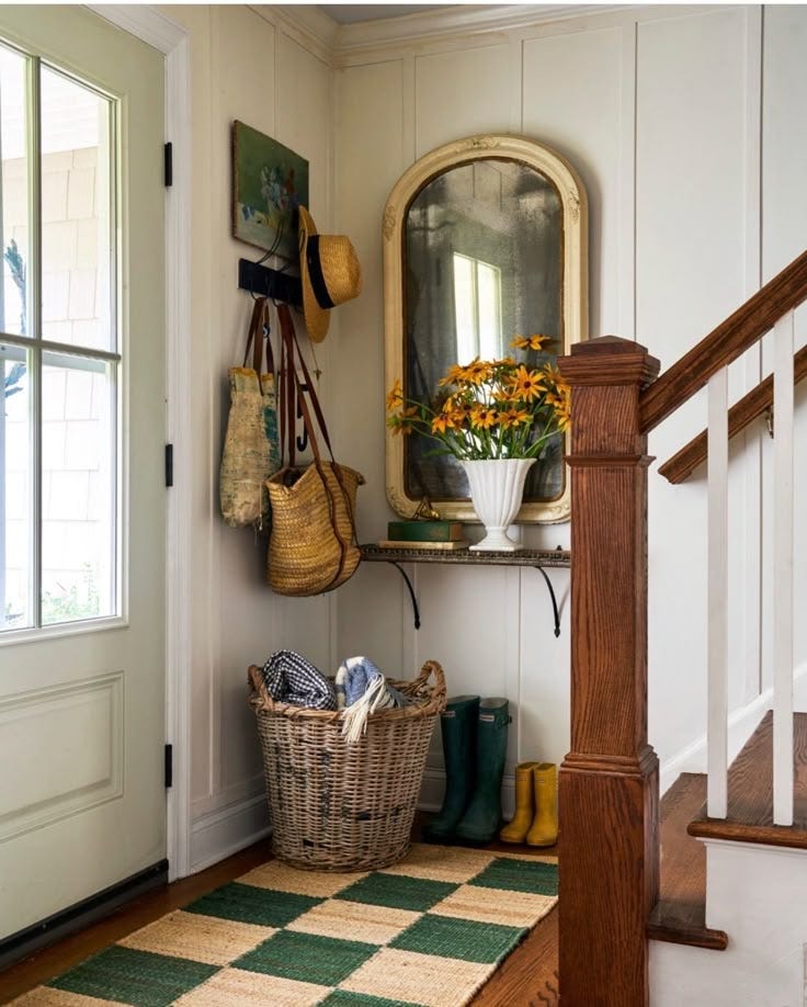 This may contain: the entryway is clean and ready for us to use as a storage area in the house