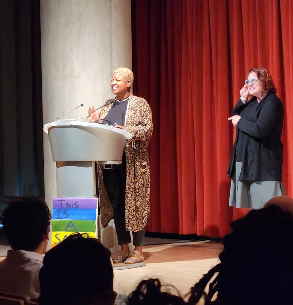 Junauda Petrus reads from her YA novel (accompanied by ASL interpreter)
