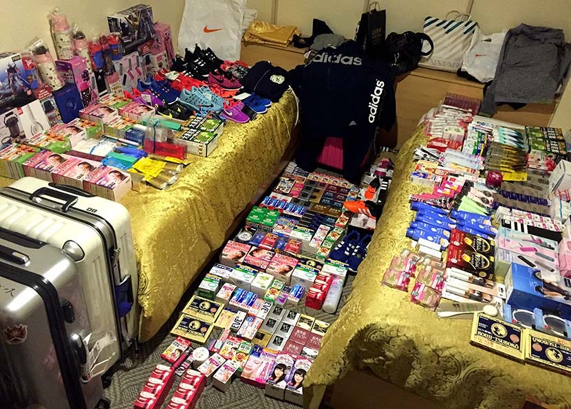 Items bought by ‘daigou’ are displayed in a hotel room in Tokyo, Japan, Feb. 29, 2016. VCG