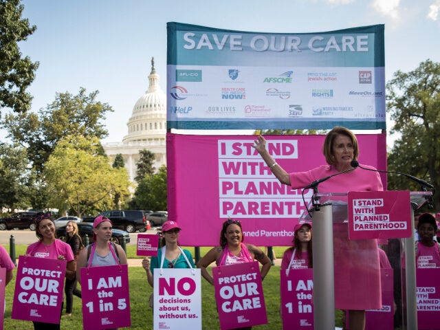 House Minority Leader Nancy Pelosi (D-CA) speaks to the crowd during a protest against the House Minority Leader Nancy Pelosi (D-CA) speaks to the crowd during a protest against the