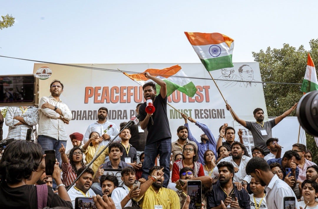 Abhijeet Dipke, founder of the Cockroach Janta Party speaks during a protest demanding the resignation of Education Minister in New Delhi, India, on 20 June.