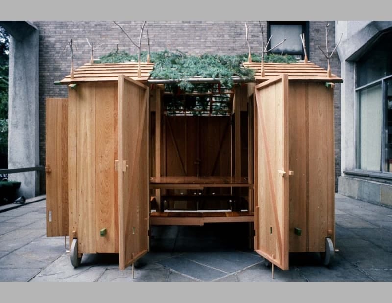 A sukkah with an open door by artist Allan Wexler, commissioned by the Jewish Museum of New York