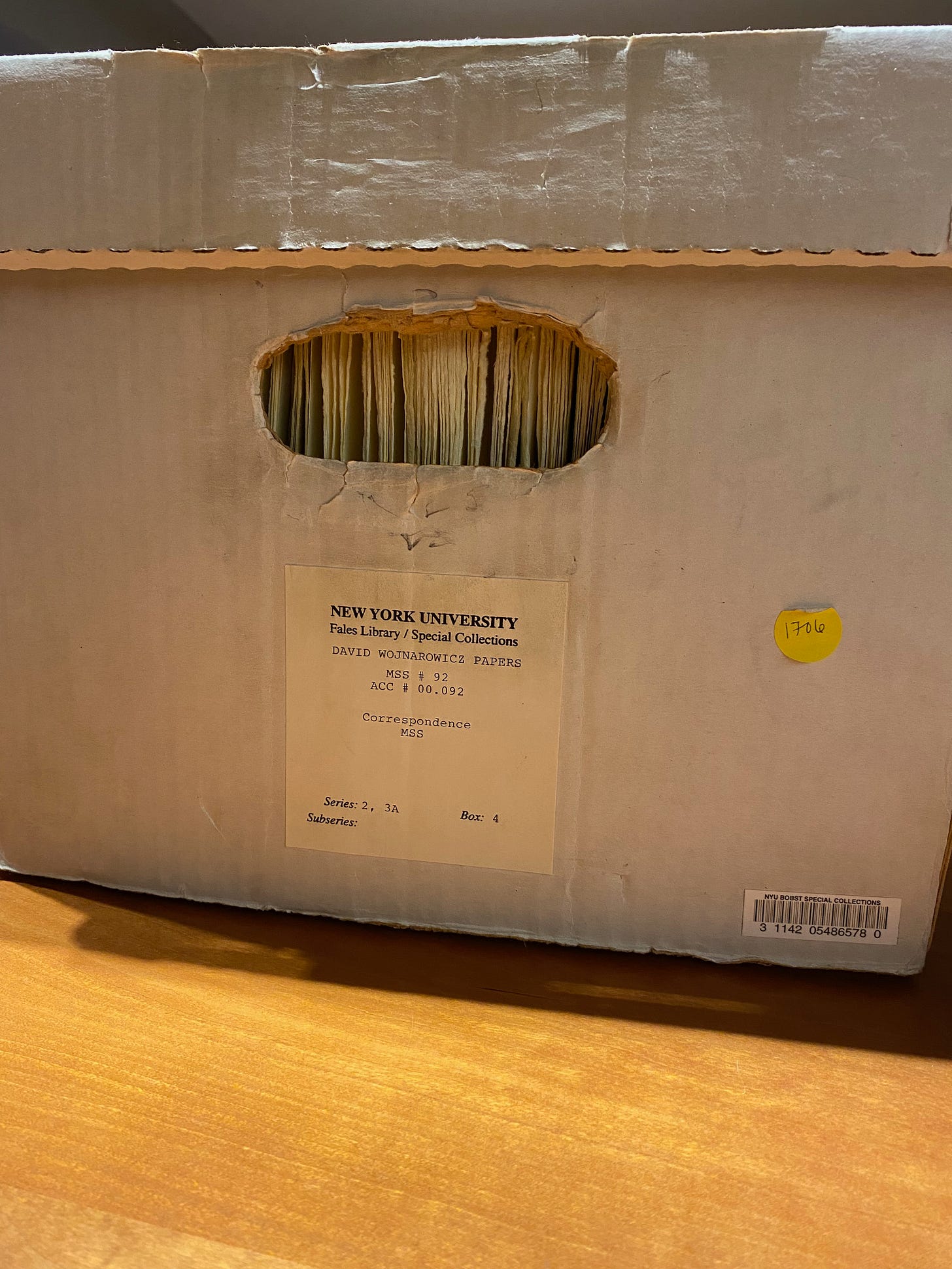 An unopened box of David Wojnarowicz's Papers, filled with files.