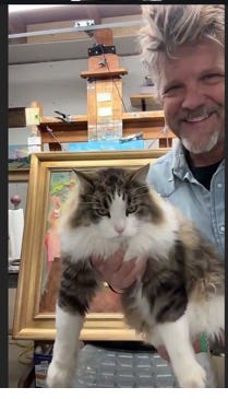 A person holding a cat
AI-generated content may be incorrect. A person holding a cat
AI-generated content may be incorrect.