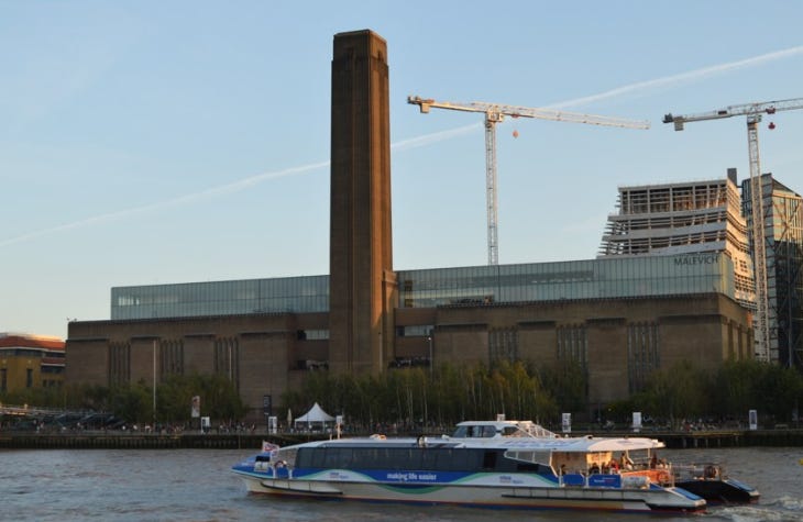 A riverboat passing in front of Tate Modern A riverboat passing in front of Tate Modern