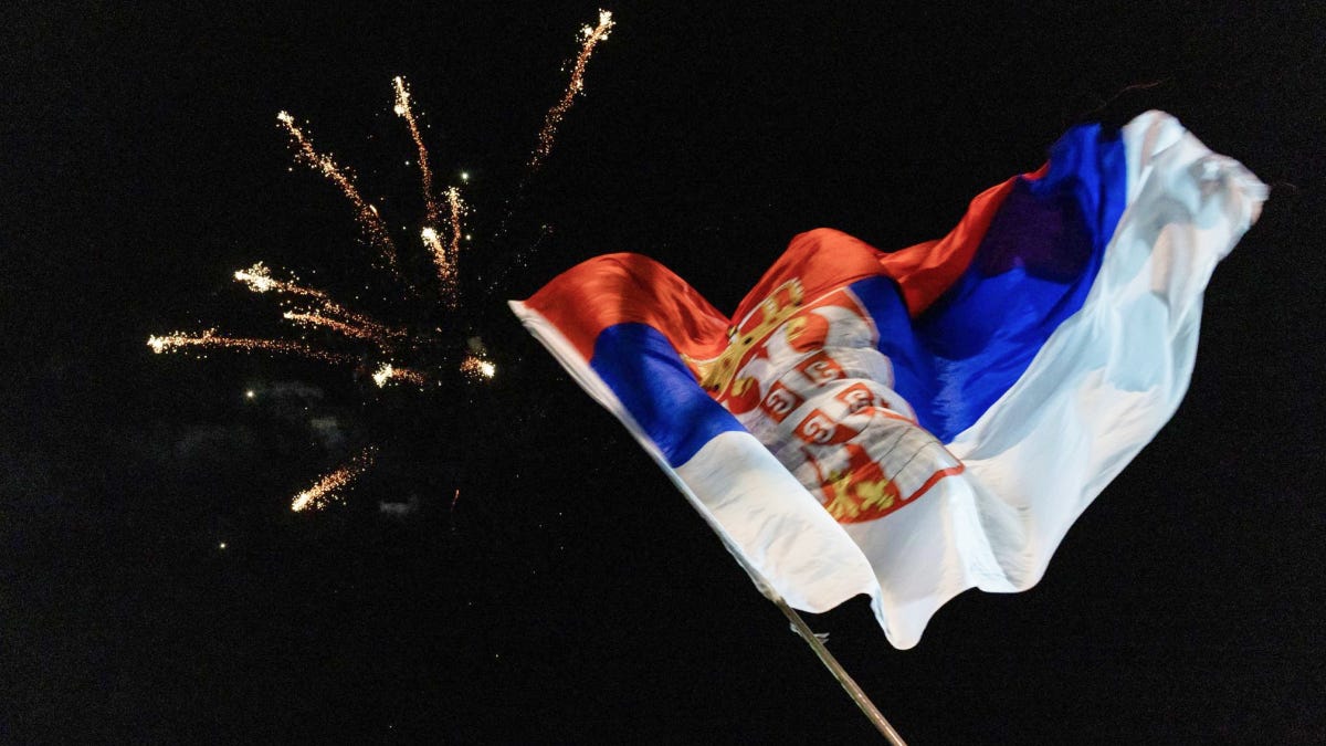 Supporters of electoral list No. 3, “Student List - Students Win,” celebrate the list’s victory in the Serbian parliamentary elections in the city center of Novi Sad, Vojvodina, Serbia, on October 26, 2026, one day after the vote. (Photo by Maxim Konankov/NurPhoto via AP)