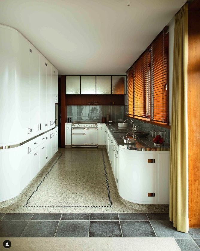 This may contain: the kitchen is clean and ready for us to use This may contain: the kitchen is clean and ready for us to use