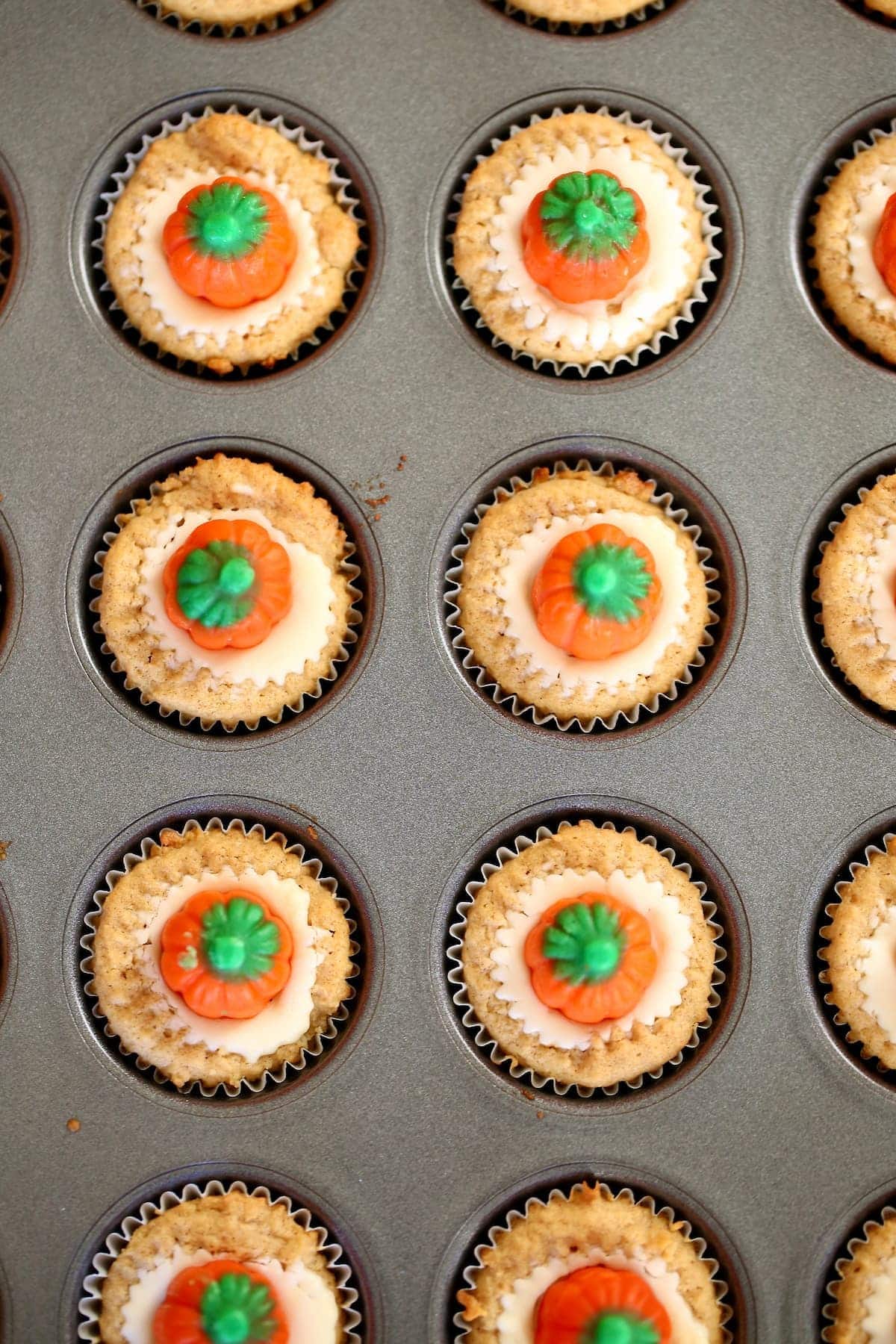 A mini baking tray of Halloween cupcakes.