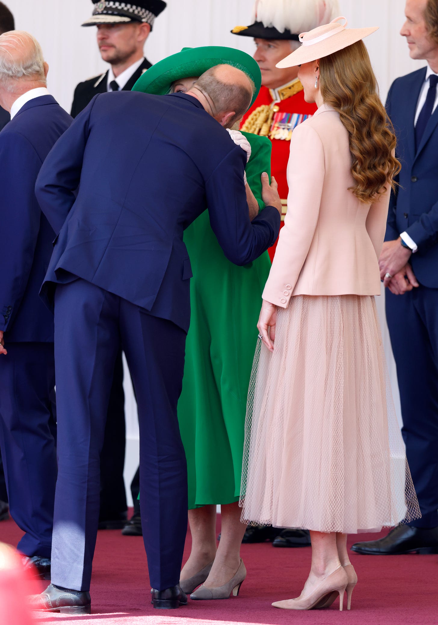 Prince William kisses Queen Camilla on the cheek Prince William kisses Queen Camilla on the cheek
