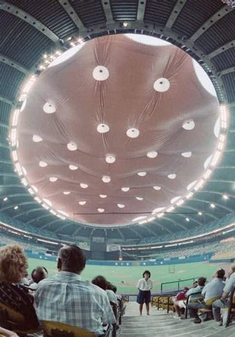 Olympic Stadium roof in raised and lowered position next to an image of Jean Jacket from the film Nope.