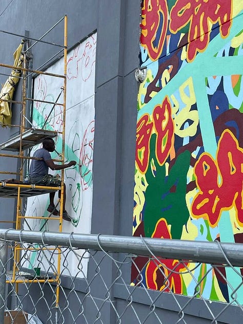 Series of nine photos depicting the evolution of my mural "Bound Together" located at 10th and Callowhill Streets in Philadelphia's Chinatown area.