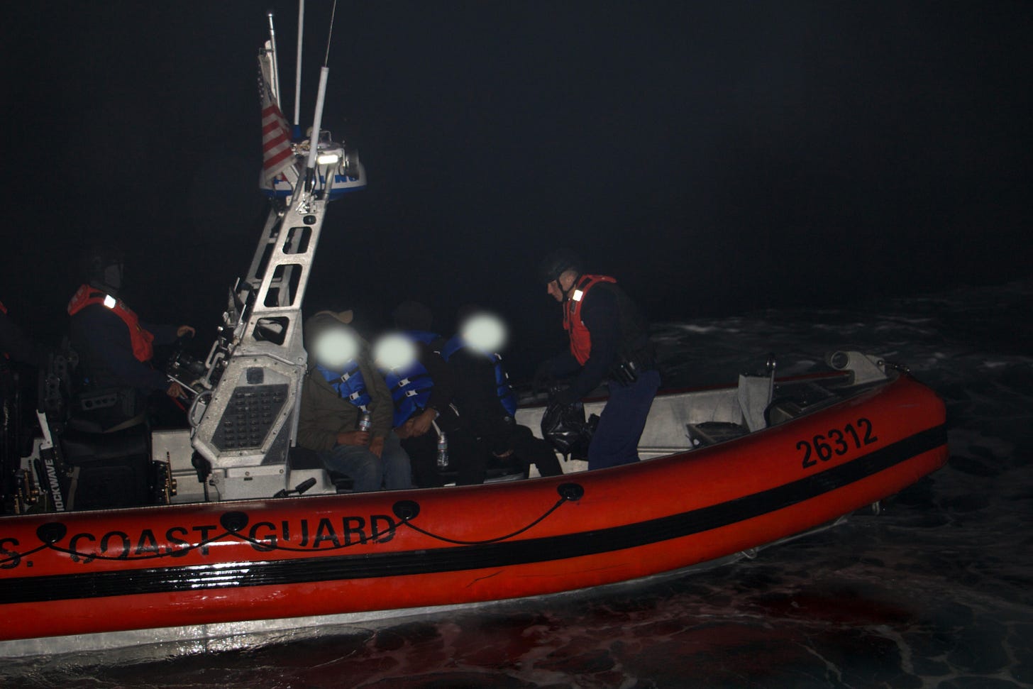 A crew from the USCG Cutter Benjamin Bottoms is sent to board a vessel involved in a human smuggling attempt (Feb. 25, 2025). A crew from the USCG Cutter Benjamin Bottoms is sent to board a vessel involved in a human smuggling attempt (Feb. 25, 2025).