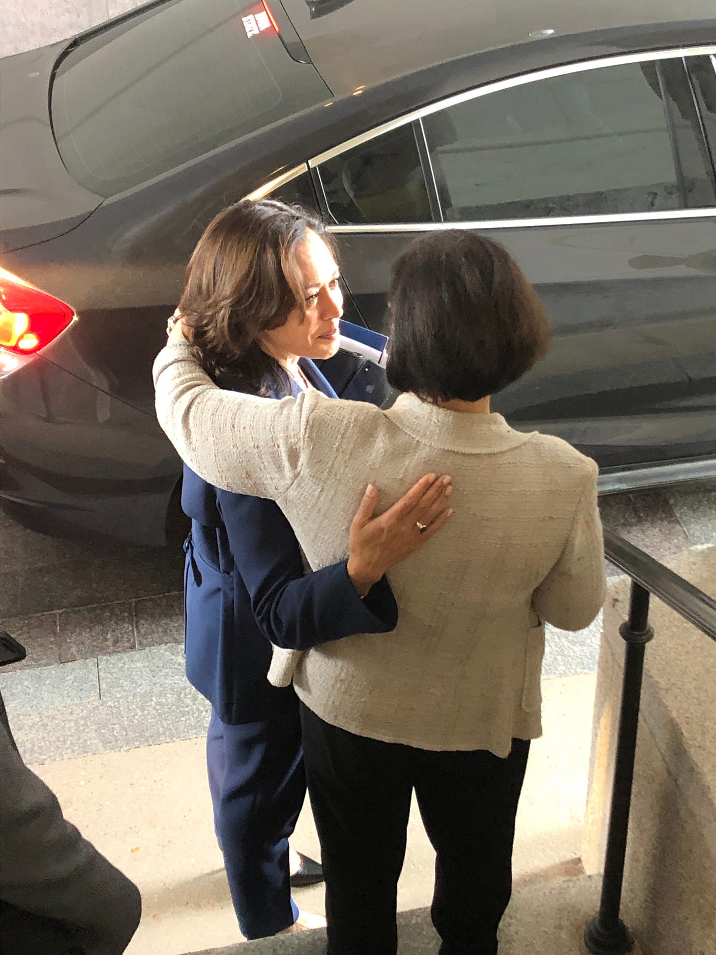 Kamala Harris and another female senator embrace at an entrance to the US Capitol Kamala Harris and another female senator embrace at an entrance to the US Capitol