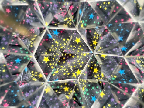 Photos of toys and instruments through a kaleidoscope