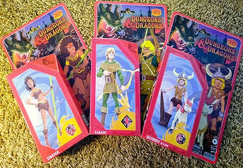 Front & Back Boxes of D&D Cartoon Classics Action Figures: Diana, Hank, Bobby & Uni