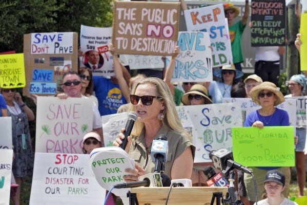 Opponents stage protests against Florida state parks development plans  pushed by DeSantis | AP News