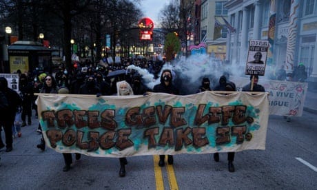 Protesters march against ‘Cop City’ in Atlanta, Georgia, on 21 January. Protesters march against ‘Cop City’ in Atlanta, Georgia, on 21 January.