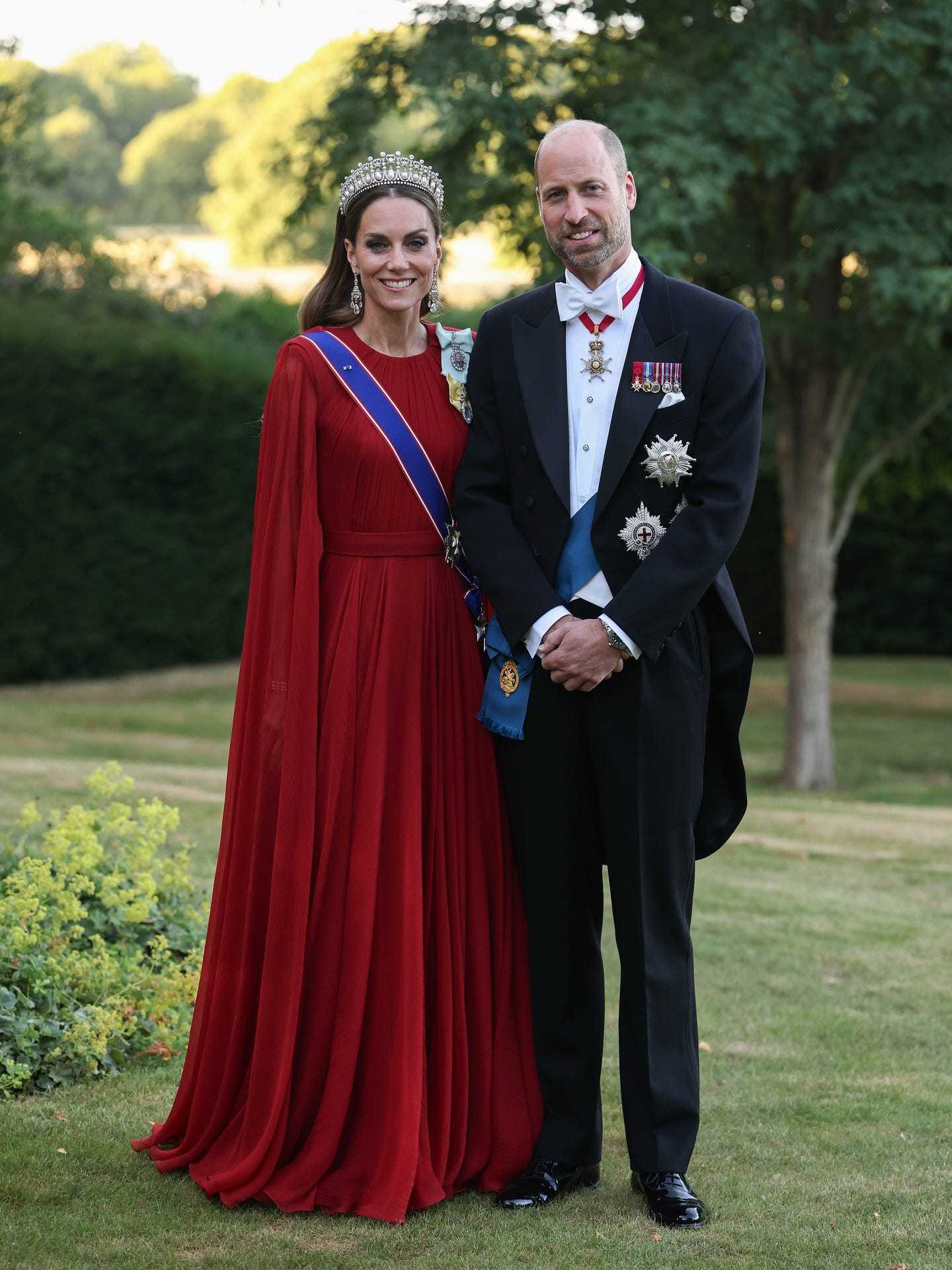 William and Catherine standing in Windsor gardens ahead of state banquet