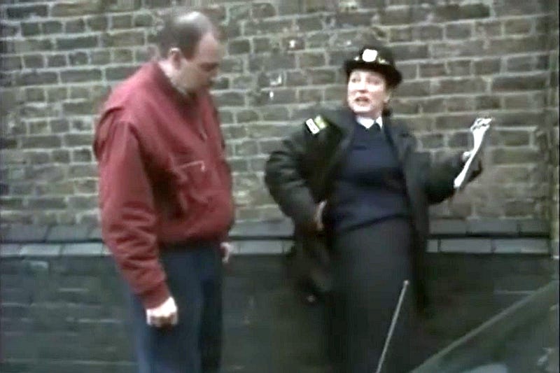 Screen shot from the fast show, showing Arabella Weir asking whether her bum looks big in this