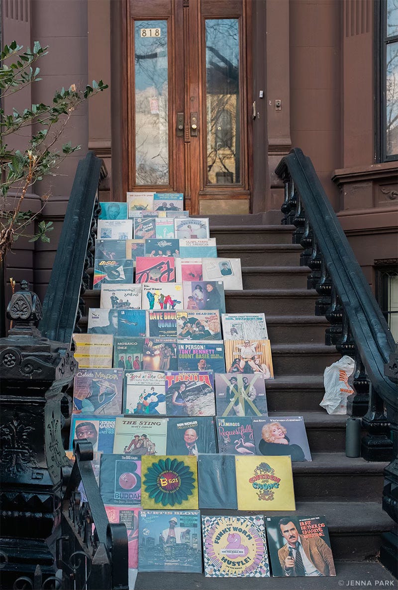 records for sale on a stoop