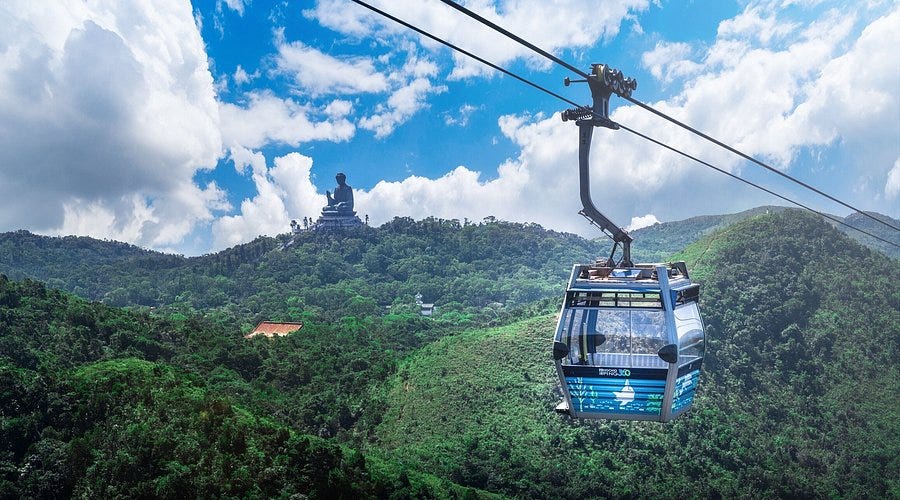 https://dynamic-media-cdn.tripadvisor.com/media/photo-o/2a/0f/c3/10/ngong-ping-360-cable.jpg?h=500&s=1&w=900