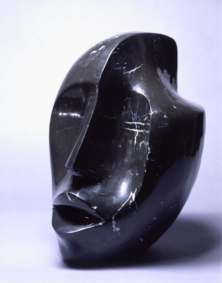 Elizabeth Catlett, Singing Head, 1980, black Mexican marble, Smithsonian American Art Museum, Museum purchase, 1989.52