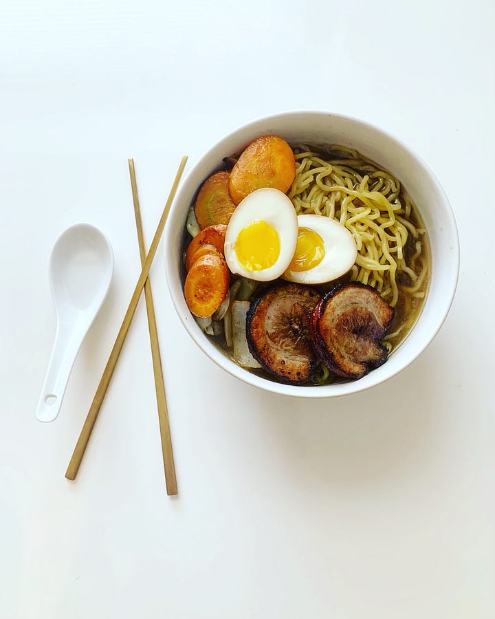 four photos of different kinds of soup