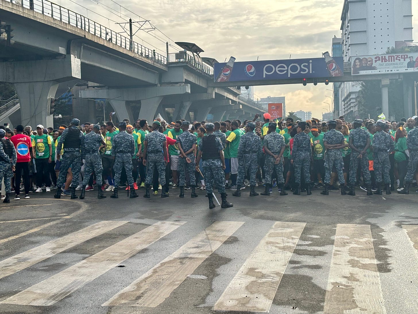 Soldiers holding back the second wave runners at the 2023 Great Ethiopian Run
