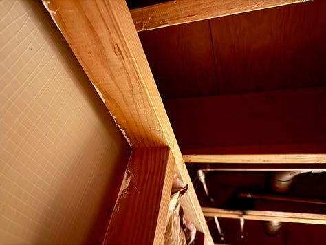 Photo mosaic of fire blocking and insulation being installed in basement walls.