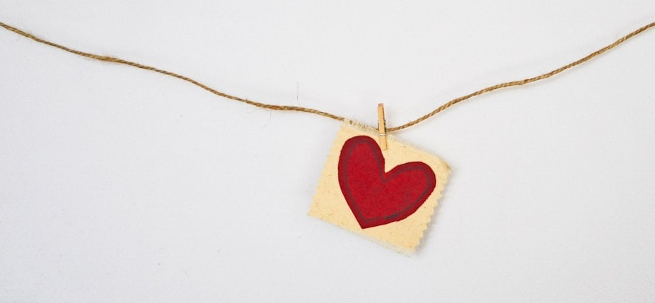 heart-shaped red and beige pendant