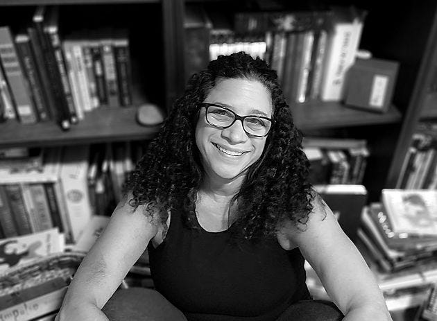 Black and white photo of the author, Jenny Morelli.